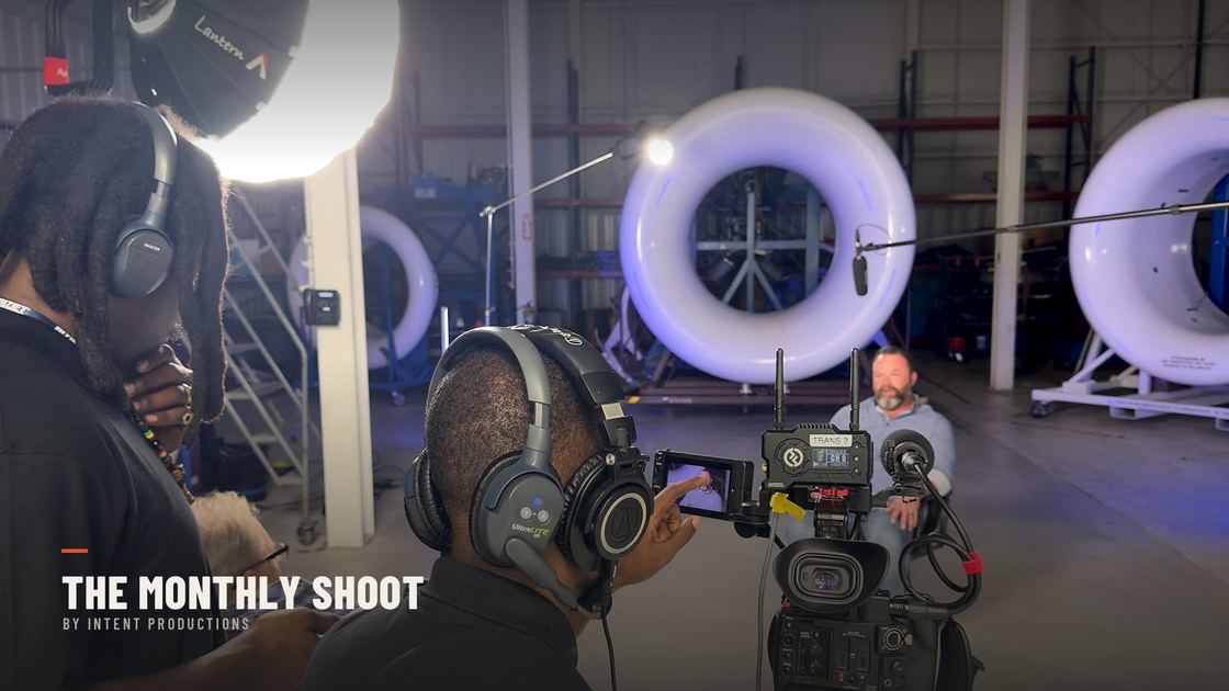 Intent Productions crew filming an interview inside an industrial facility